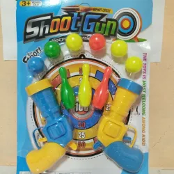Juego de pistolas con bolas y bolos 