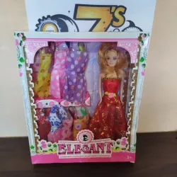 .👗🧸 Muñeca con vestidos