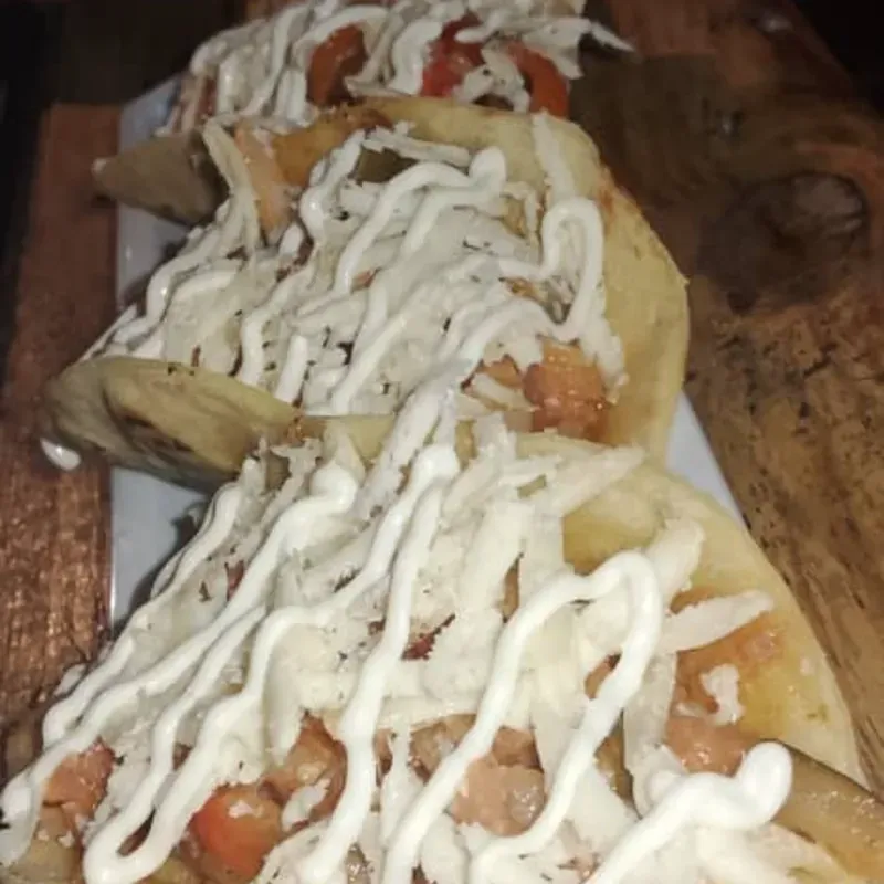 Tacos de jamón con queso blanco y vegetales