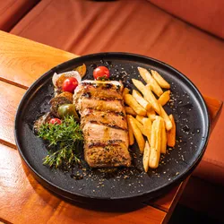 Lomo de cerdo con costra de hierba y mostaza