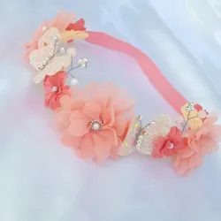 Diadema de flores con mariposas de vinil