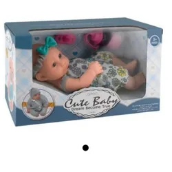 Muñeca con traje azul 