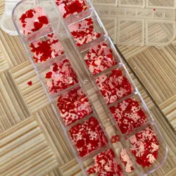 Encapsulado de corazones,flores y mariposas