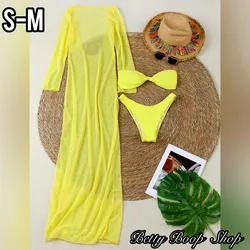 Bikini amarillo con vestido de pareo