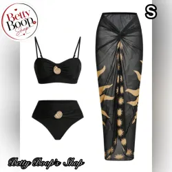 Bikini negro con caracoles dorado y pareo con estampado de soles
