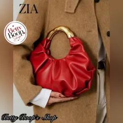 Bolso de mano rojo con mango dorado