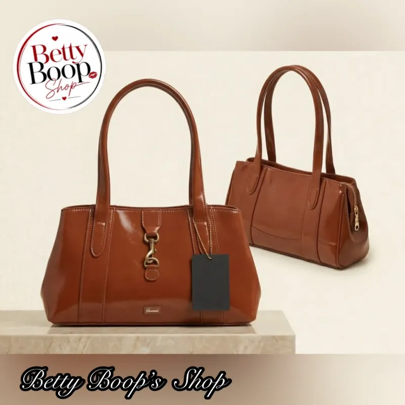 Bolso ocre grande con broches de adorno