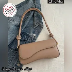 Cartera beige con nudos