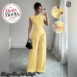 Conjunto amarillo pastel de top asimétrico