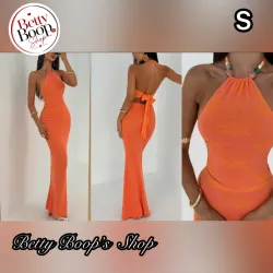 Conjunto atardecer naranja con flores estampadas