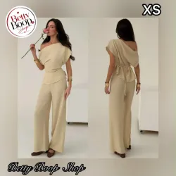 Conjunto beige de blusa de un hombro