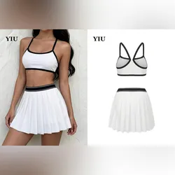Conjunto blanco de tenis con saya de tachones