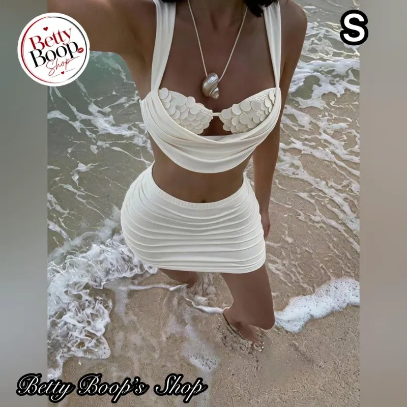 Conjunto blanco hueso con top de lentejuelas