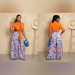 Conjunto de pantaloneta con blusa naranja y pantalón estampado