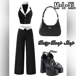 Conjunto negro y blanco de chaleco y pantalón