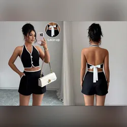 Conjunto negro y blanco de short y chaleco