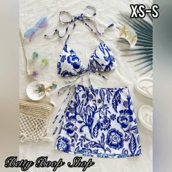 Conjunto playero blanco de top y falda con estampado azul