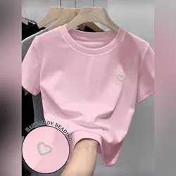 Pulover rosa de mujer con corazón de perlas