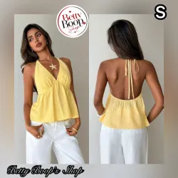Top amarillo pastel con amarre al cuello