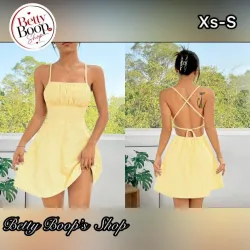 Vestido amarillo pastel de tirantes con espalda abierta