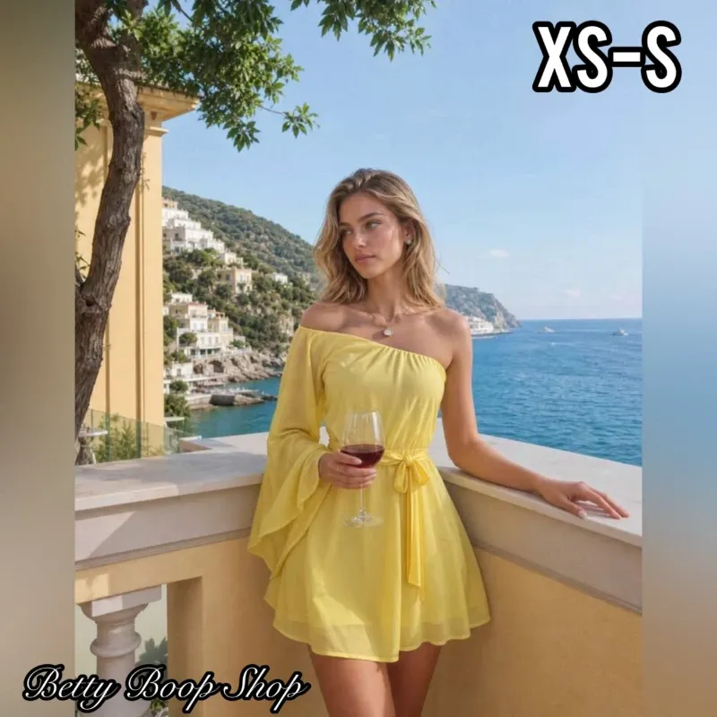 Vestido amarillo veraniego de una manga larga y detalle de lazo
