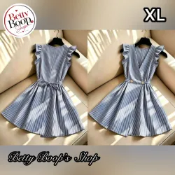 Vestido azul a rayas detalle de vuelos, dos botones y amarre a la espalda