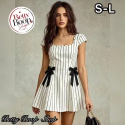 Vestido blanco con rayas y lazos negros