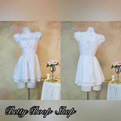 Vestido blanco corte princesa de manguitas