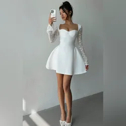 Vestido blanco corte princesa mangas largas de encaje