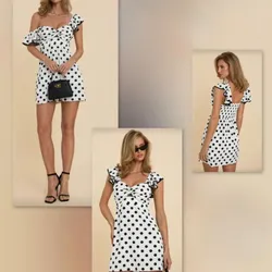 Vestido blanco de lunares con mangas de vuelos