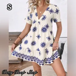 Vestido blanco estampado con flores azules y mangas