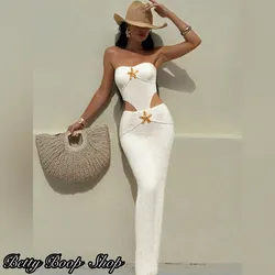 Vestido body blanco pegado con estrella dorada