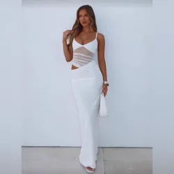 Vestido blanco con transparencias en la cintura