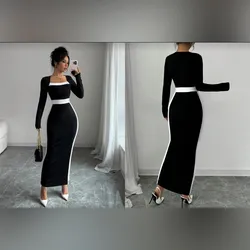 Vestido negro con listas blancas y mangas largas