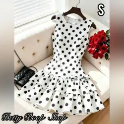 Vestido polka dot sin mangas, cuello en U, con vuelos y detalle de lazo