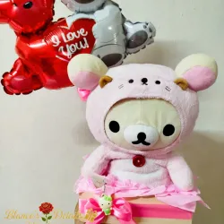 Caja de regalo con peluche