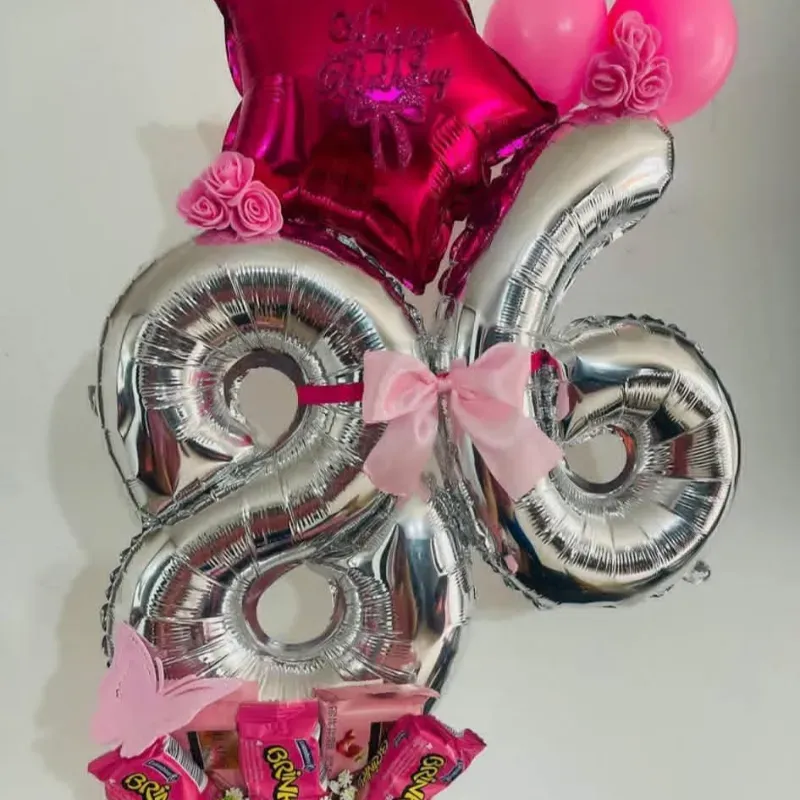 Regalo con globos y confituras
