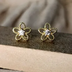 Aretes dorados flor con bisel