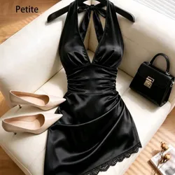Vestido negro asimétrico con encaje