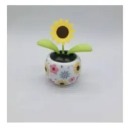 ADORNO DE FLOR CON PANEL SOLAR PARA AUTOS