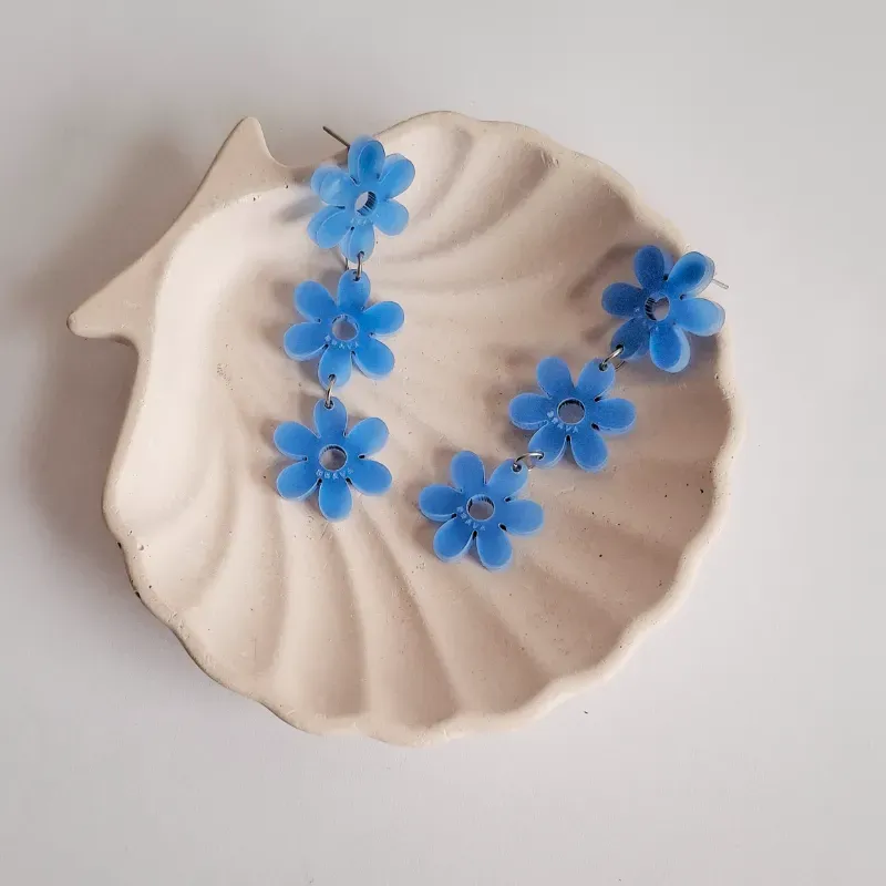 Flores largas azul opaco