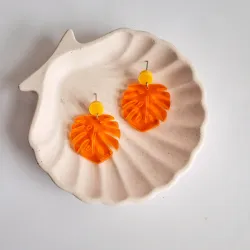 Monsteras medianas naranjas y amarillo