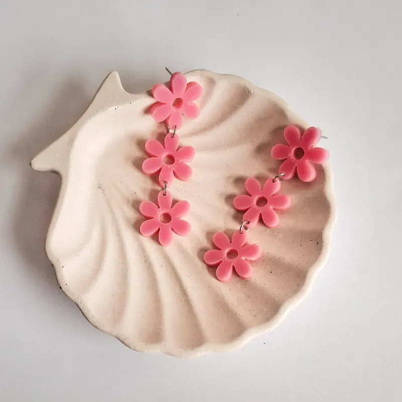 Pendientes largos de flores rosa claro