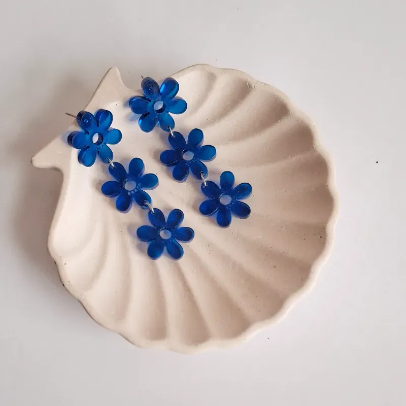 Flores largas azul traslucido