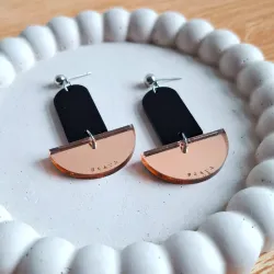 Péndulo negro y oro rosa