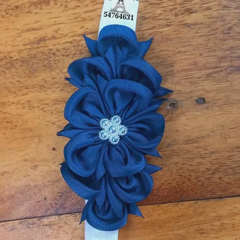 Diadema floral con flor exótica azul