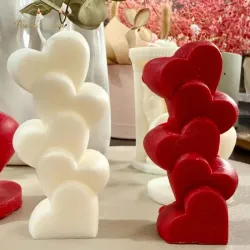 Vela en forma de corazones en vertical