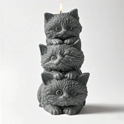 Vela en forma de tres gaticos