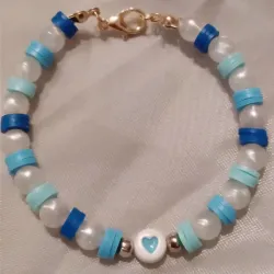 Pulsera de fimos planos y perlas con separador de corazon