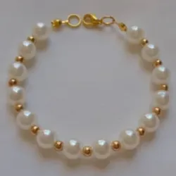 Pulsera de perlas y balines